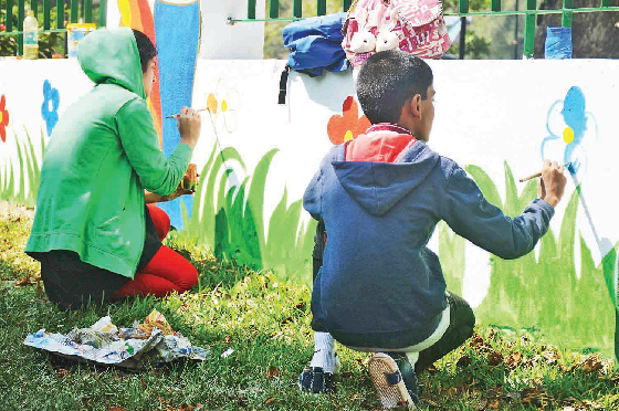 BAL DIWAS: Children paint colourful flowers on a wall at Bal Bhavan, Panaji on the occasion of Children’s Day. BAL DIWAS: Children paint colourful flowers on a wall at Bal Bhavan, Panaji on the occasion of Children’s Day.