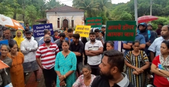 Camurlim residents march to p’yat in rain, seek revocation of permission to project