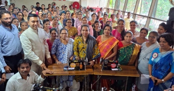 CM hands over sewing machines to 150 women in Sanquelim