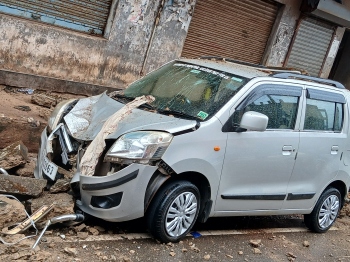 ﻿Margao slab collapse: Narrow escape for minor boy as cars crushed by debris