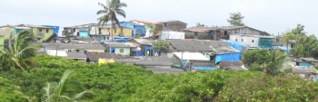 Govt can't redevelop slum areas in  3 towns as they are not notified