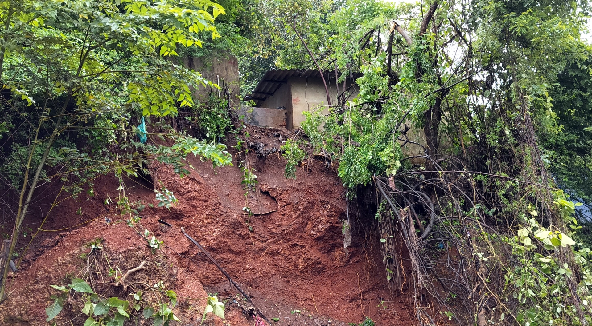 The Goan EveryDay Downpour triggers landslide, threatens houses in Mapusa