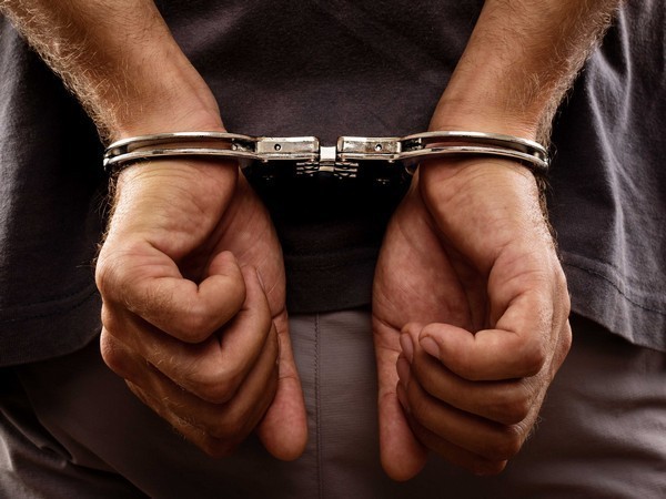 Cop booked for stalking ex-girlfriend
