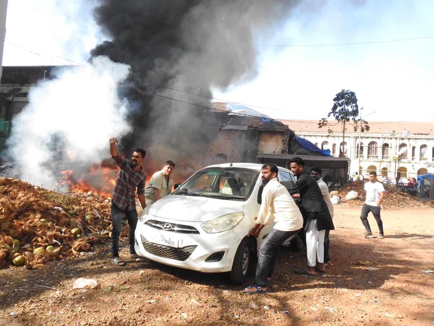 Garbage dump on fire behind MMC building  creates panic