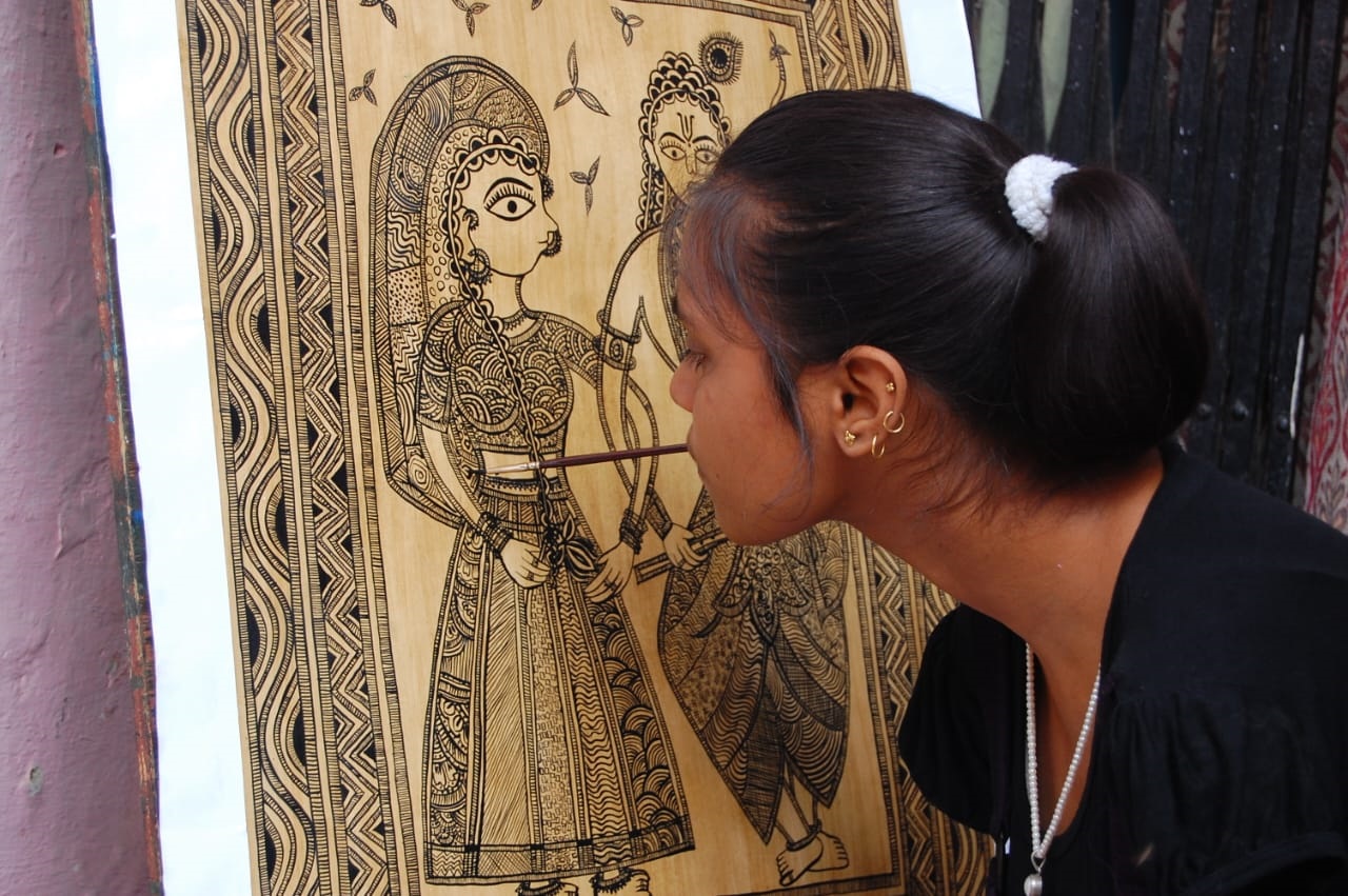 Strokes of brilliance: Triple amputation does not deter this artist!