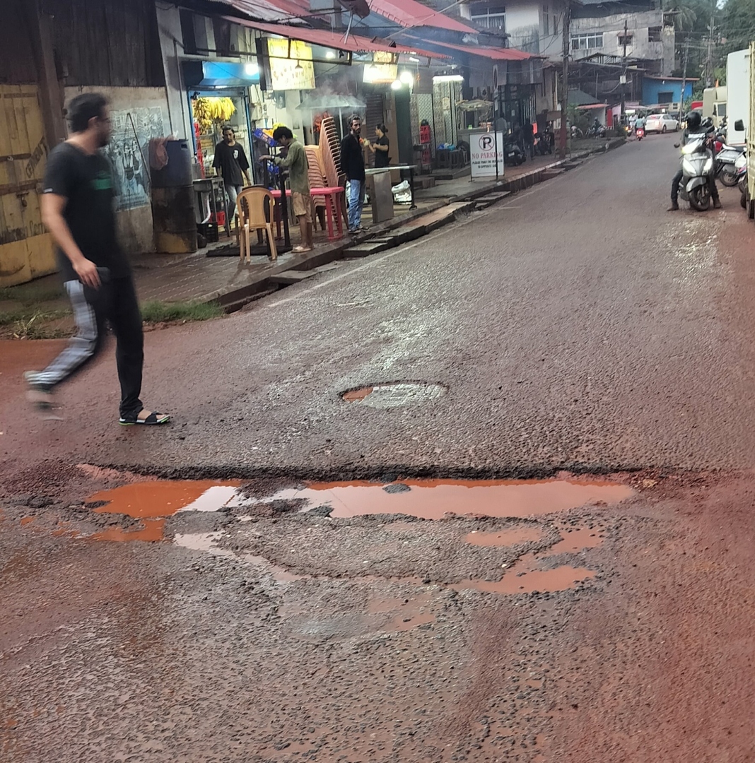 Motorists and pedestrians struggle  as Angod’s roads left in ruins