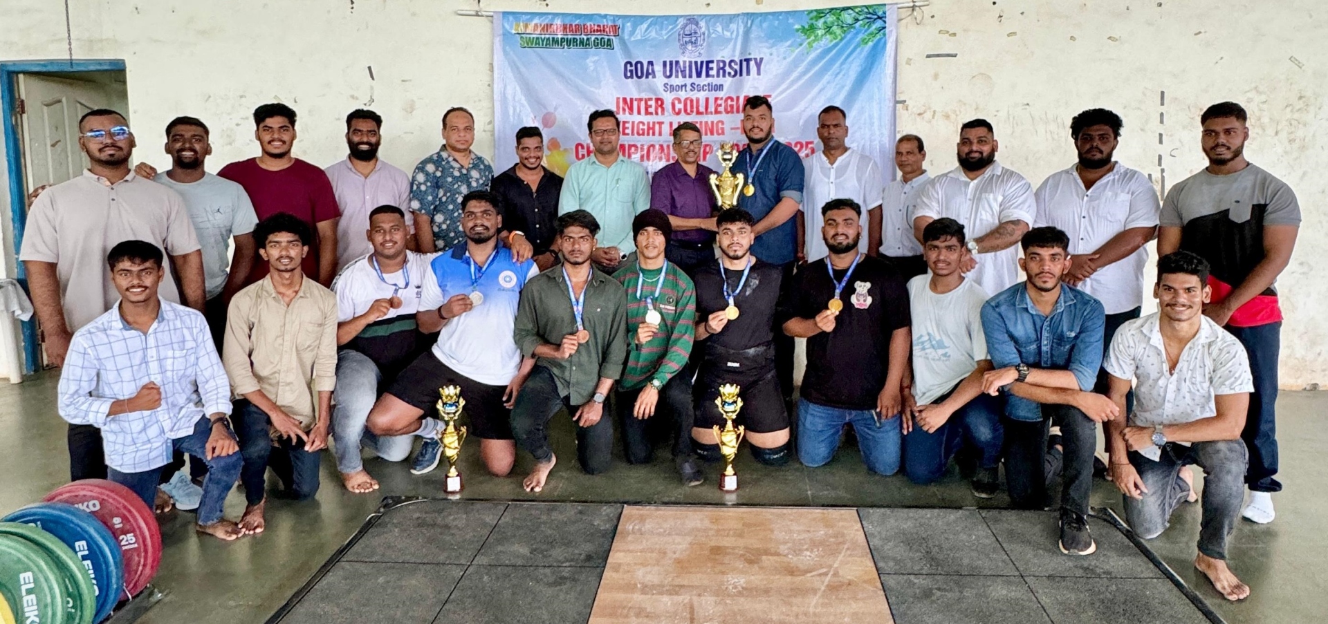 ﻿DM's College secure men's weightlifting title hat-trick