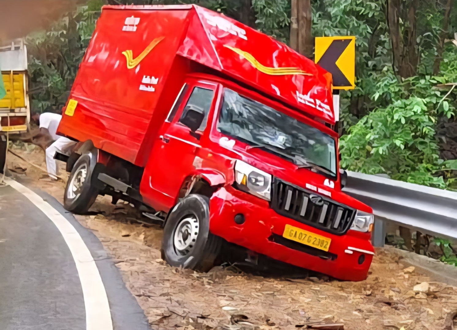 Postal van stuck in mud at Karmalghat