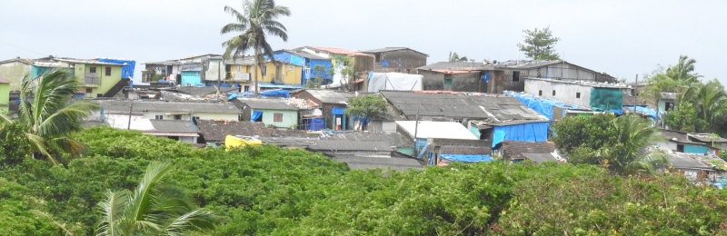 Govt can't redevelop slum areas in  3 towns as they are not notified