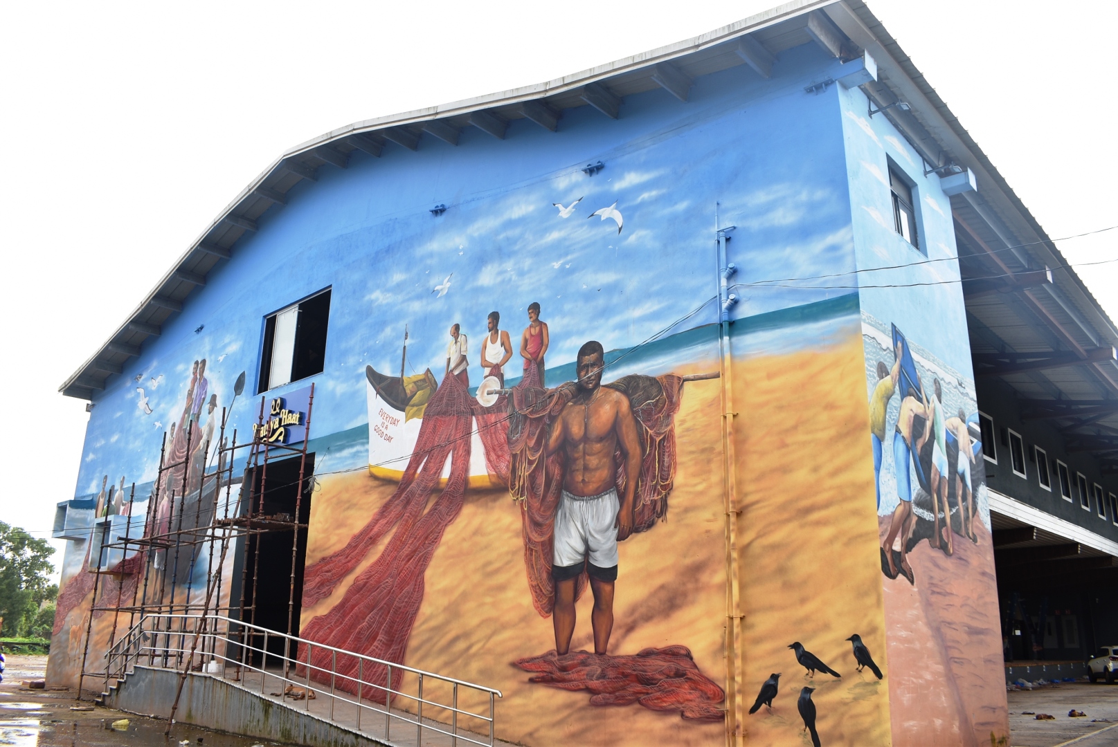 Mural of endangered fish on market wall replaced with Goan fishermen