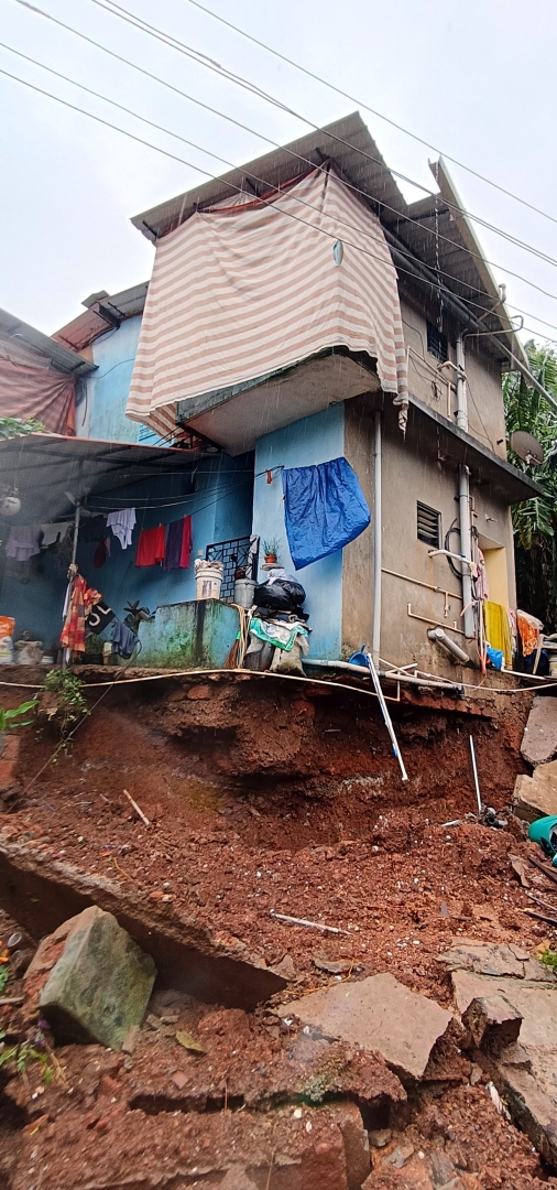 Retaining wall gives way, house in Chimbel on verge of collapse