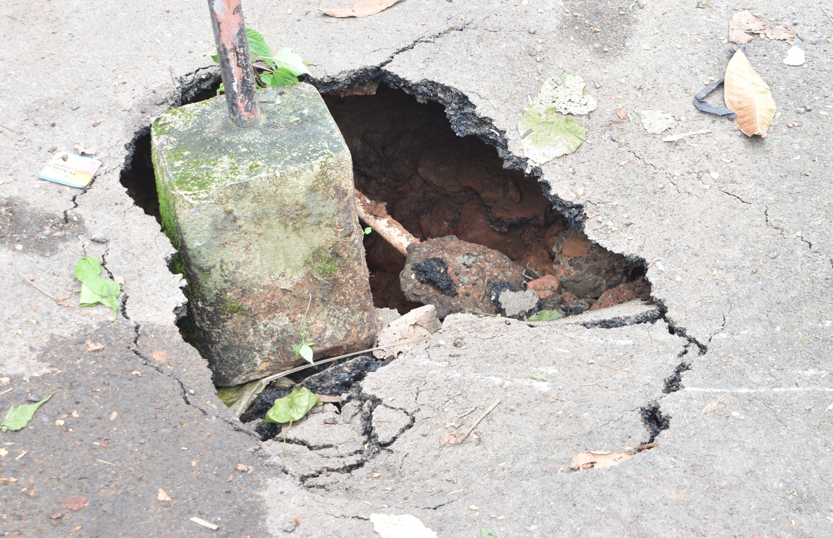 Portion of internal  road caves in at  Madel-Fatorda