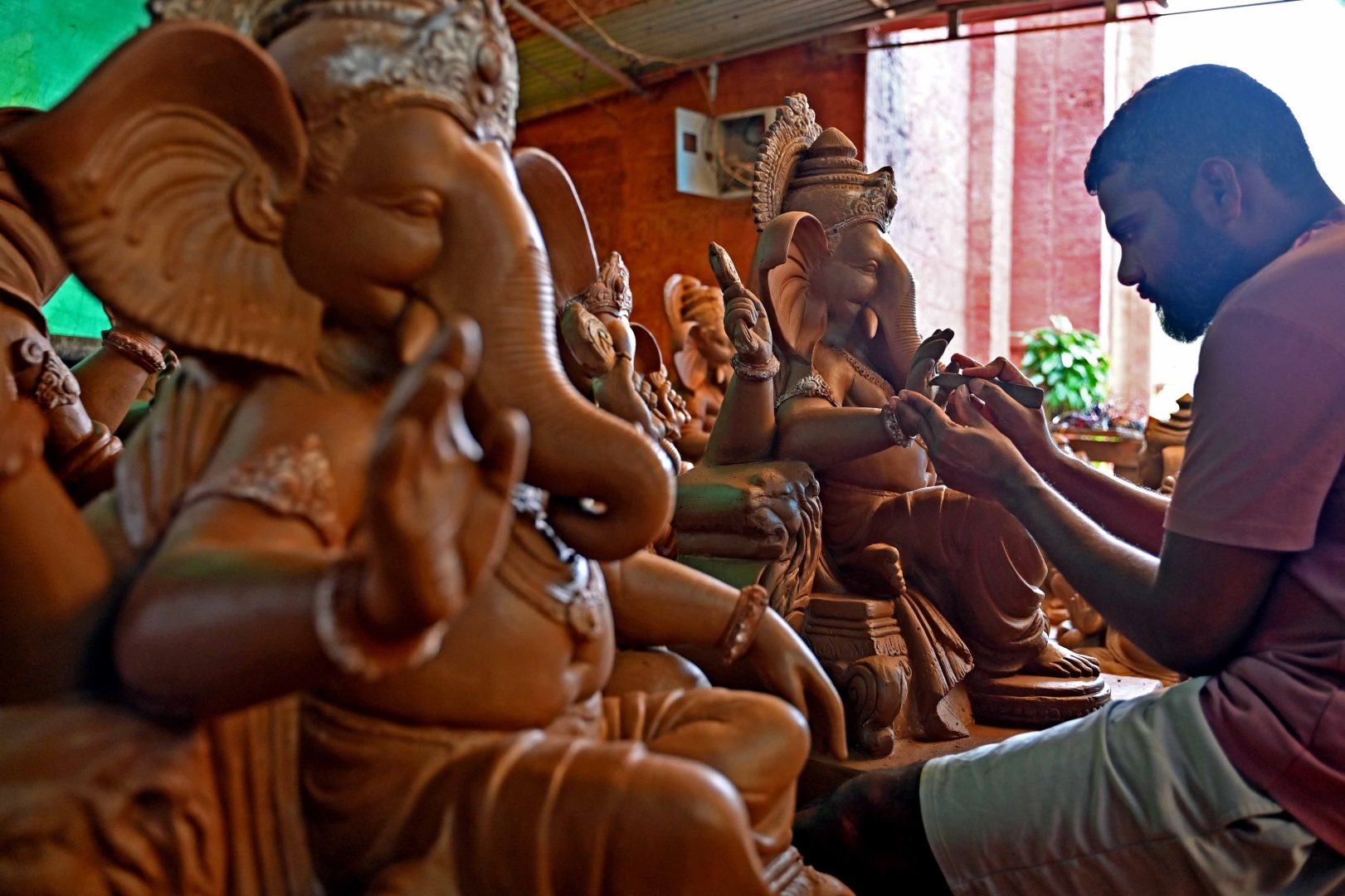 Generations of Goan artisans shape Ganesh idols against the odds