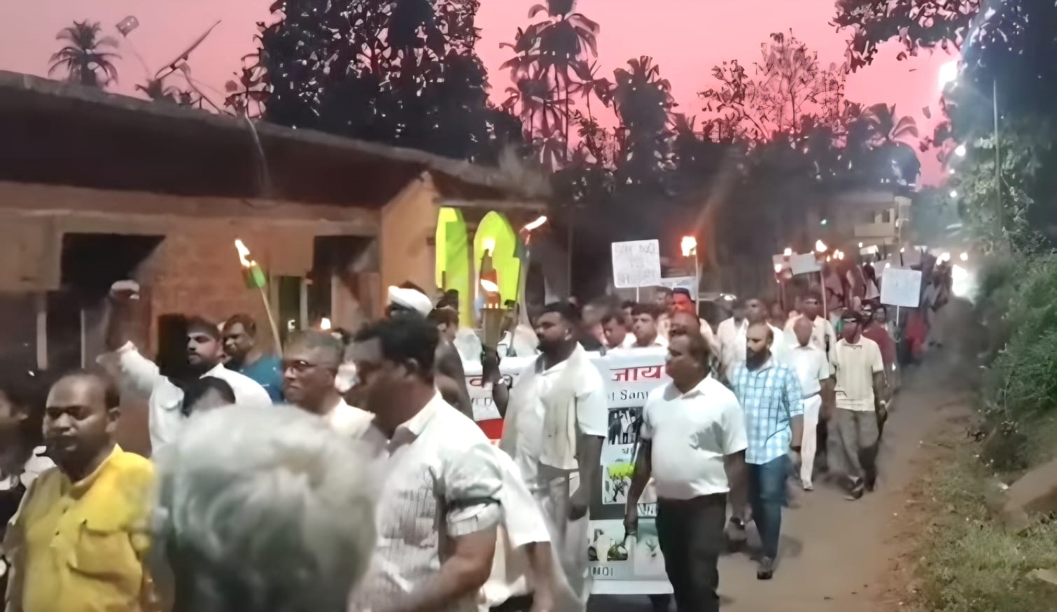 Protesters hold torch rally against bandhara project in Mirabag