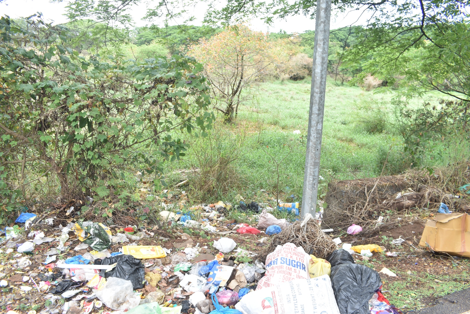 Entire Comba ring road stretch remains  littered with mounds of plastic waste