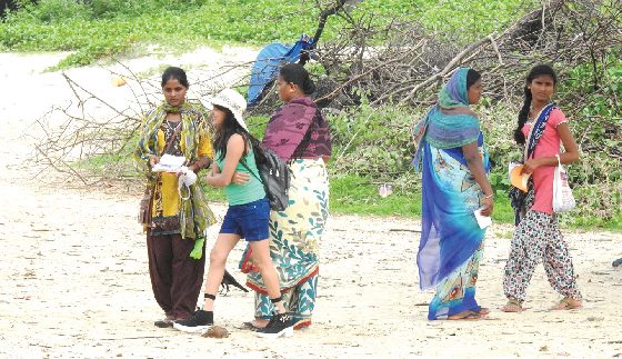 PESTERING HAWKERS INVADE ICONIC COLVA