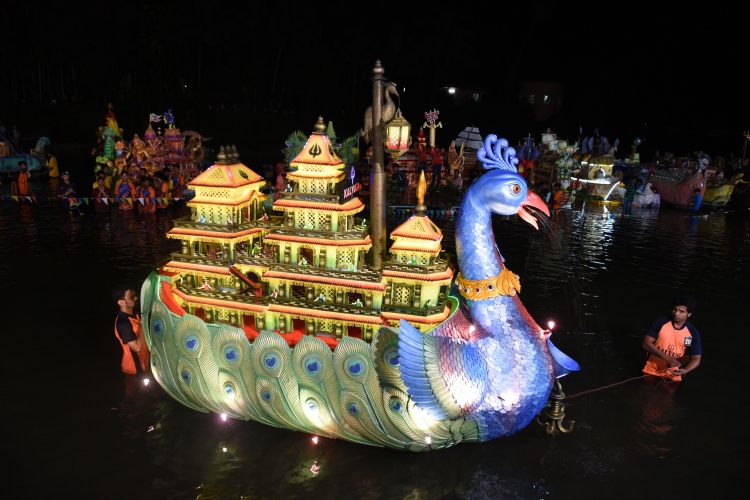 Colourful boats, lamps light up Tripurari Poornima