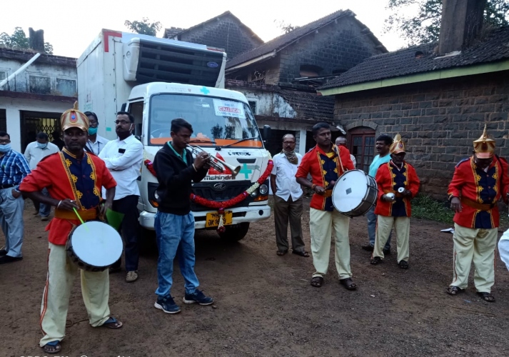 Brass band greets arrival   of Covid vaccine in Belagavi