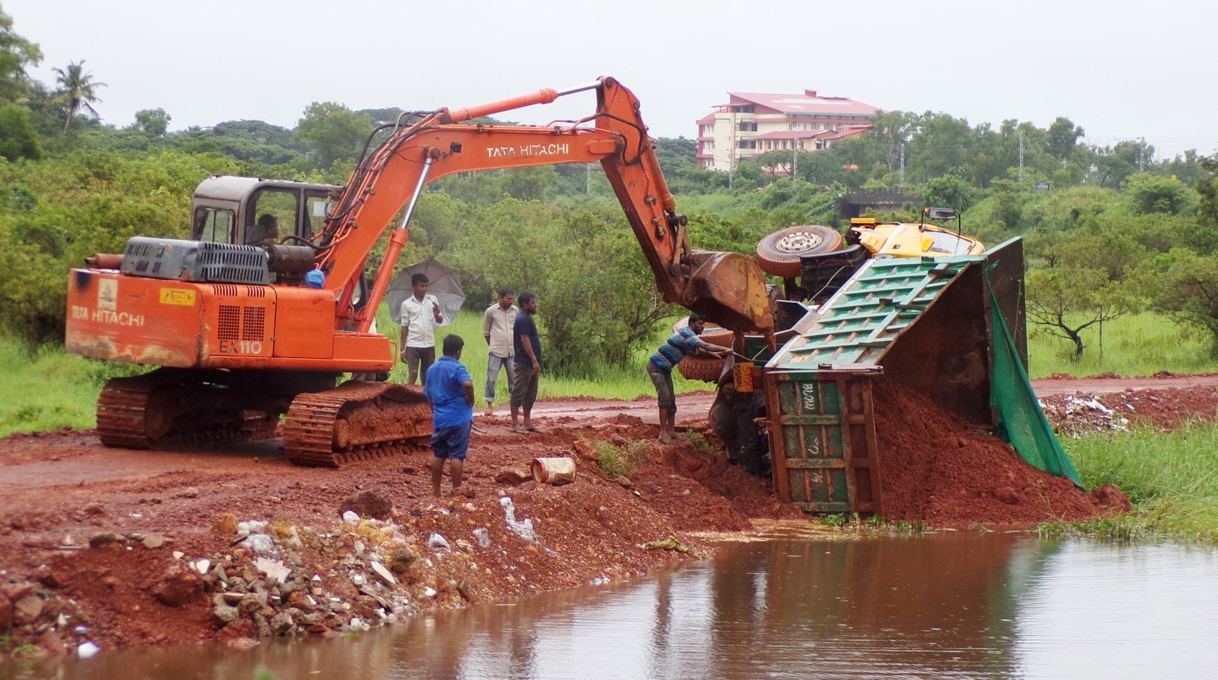 Mud-laden truck turns turtle at Mungul