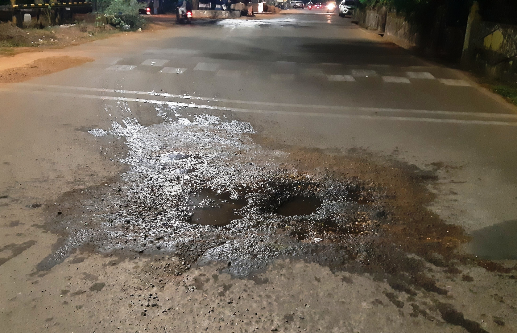 Water leakage leaves road damaged near Comba rly crossing
