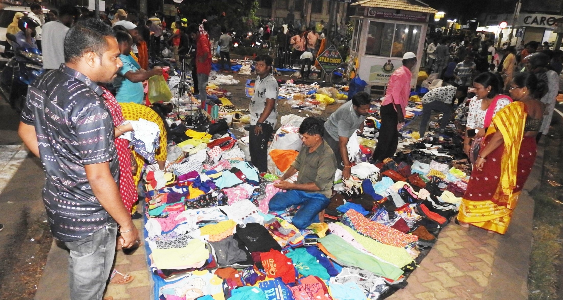 With no authority to crack a whip, street vendors make merry
